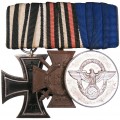 A medal bar of 3 awards for a WWI veteran, a police officer in the 3rd Reich